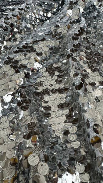 Пайеточная ткань 0,8 см на сетке (серебро на белом), 318 серебро/белый 318 в интернет-магазине  IrisTextil